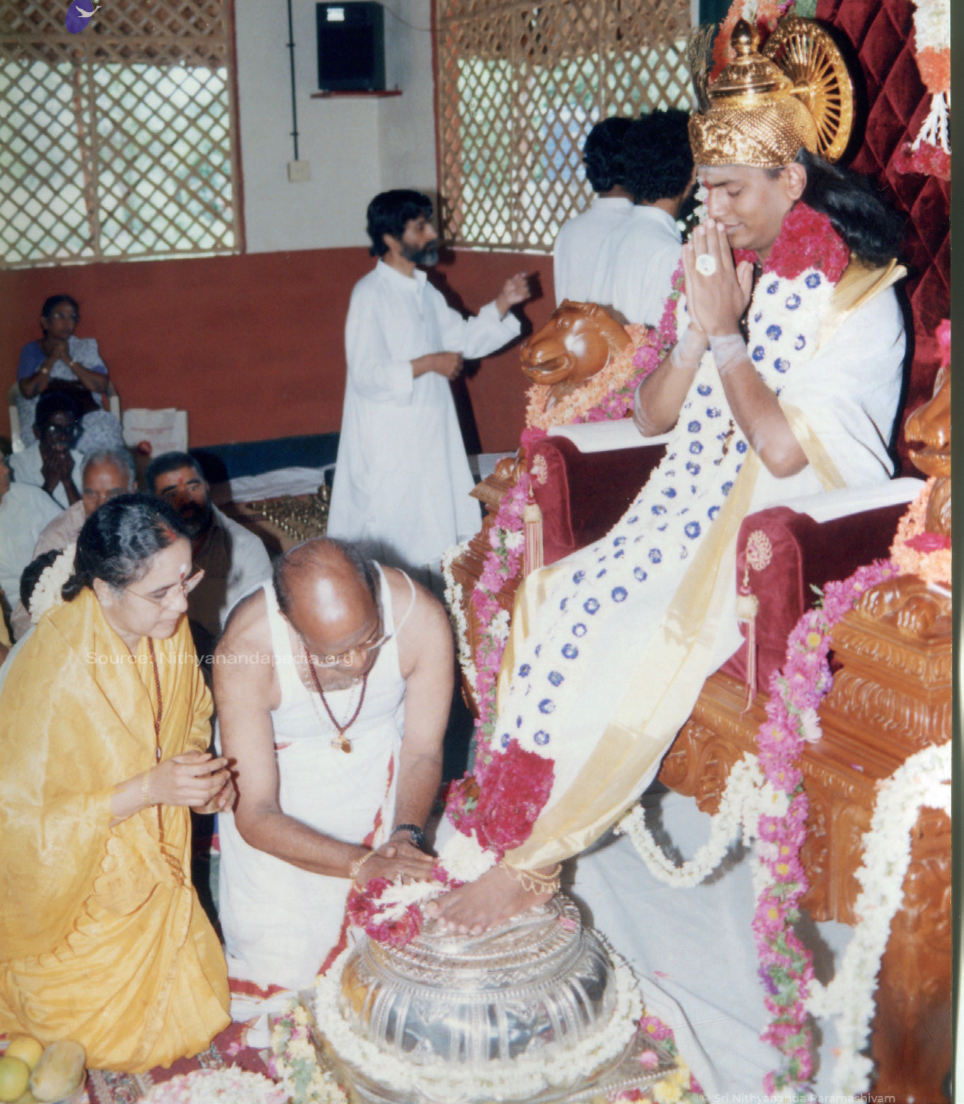 emissaries of Śri Sathya Sai Baba perform the traditional coronation ceremony and padapuja
